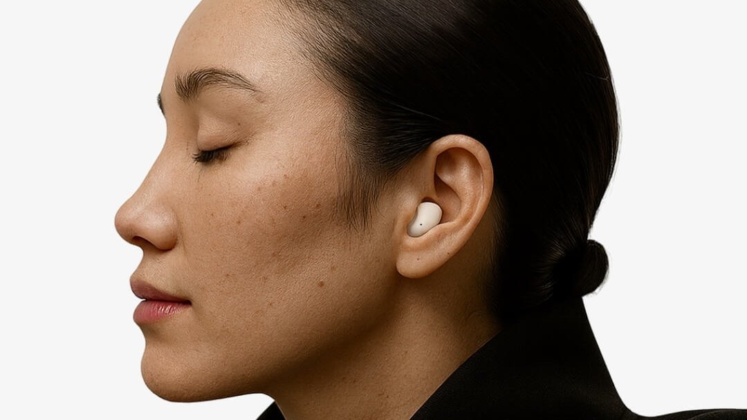 Woman in profile wearing a ViSound Air earbud